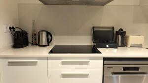 Kuchyň nebo kuchyňský kout v ubytování Beach Apartment Calafell Playa