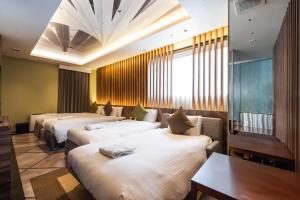 Postel nebo postele na pokoji v ubytování ALFIT HOTEL & BAR AKASAKA