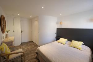 Chambres du Vieux Bistrot客房内的一张或多张床位