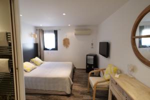 Chambres du Vieux Bistrot客房内的一张或多张床位