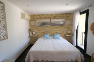 Chambres du Vieux Bistrot客房内的一张或多张床位