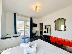 Postel nebo postele na pokoji v ubytování New Seaside Suite GOLD