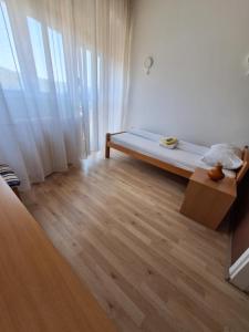 Postelja oz. postelje v sobi nastanitve Hotel Konaciste Trstenik