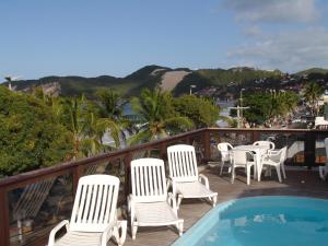 Utsikt mot bassenget på Bella Natal Praia Hotel eller i nærheten