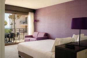 Postel nebo postele na pokoji v ubytování Thalazur Antibes - Hôtel & Spa + 37 fotografií