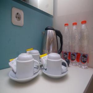 Comodidades para chá e café em Sans Hotel Nagari Malioboro