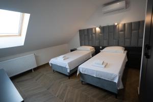 Postel nebo postele na pokoji v ubytování Villa Biser Dunava