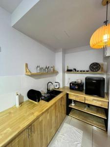 Kuchyň nebo kuchyňský kout v ubytování Mus lim Homestay Gaia Residence, Rawang + 12 fotografií