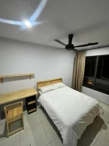 Postel nebo postele na pokoji v ubytování Mus lim Homestay Gaia Residence, Rawang