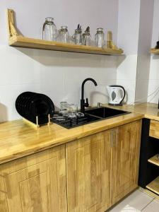 Kuchyň nebo kuchyňský kout v ubytování Mus lim Homestay Gaia Residence, Rawang