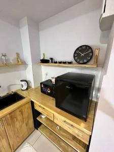 Kuchyň nebo kuchyňský kout v ubytování Mus lim Homestay Gaia Residence, Rawang