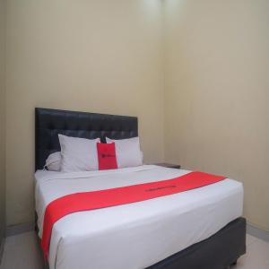 Letto o letti in una camera di RedDoorz Plus @ Timoho