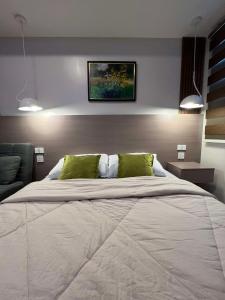 Postel nebo postele na pokoji v ubytování BE Residences cozy stay - walk to IT Park + 20 fotografií