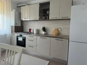 Kuchyň nebo kuchyňský kout v ubytování Zen Residence + 18 fotografií