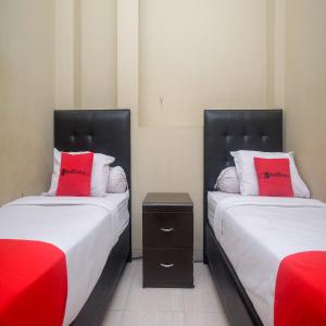 Letto o letti in una camera di RedDoorz Plus @ Timoho