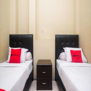 Letto o letti in una camera di RedDoorz Plus @ Timoho