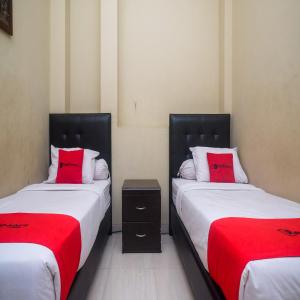 Letto o letti in una camera di RedDoorz Plus @ Timoho