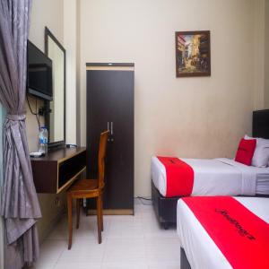 Letto o letti in una camera di RedDoorz Plus @ Timoho