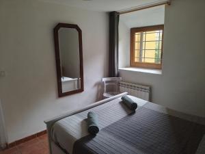 Łóżko lub łóżka w pokoju w obiekcie Casa 643km
