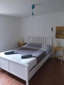 Łóżko lub łóżka w pokoju w obiekcie Casa 643km