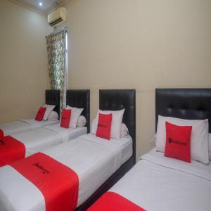 Letto o letti in una camera di RedDoorz Plus @ Timoho