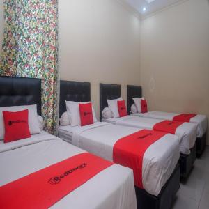 Letto o letti in una camera di RedDoorz Plus @ Timoho