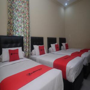 Letto o letti in una camera di RedDoorz Plus @ Timoho