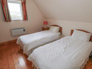 Voodi või voodid majutusasutuse No 5 Beach Cottages toas