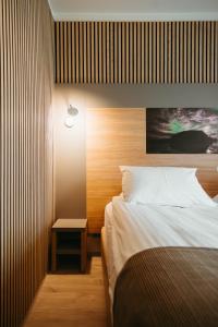 Ένα ή περισσότερα κρεβάτια σε δωμάτιο στο Hotel Vík í Mýrdal