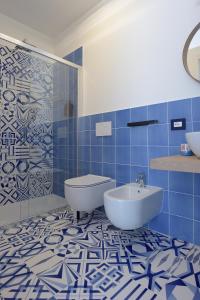 Ένα μπάνιο στο L' Orologio del Campanile vacation home +36 φωτογραφίες