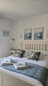 Guesthouse Augusta Insula客房内的一张或多张床位