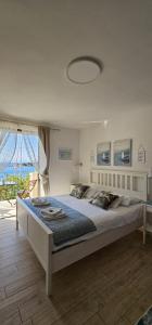Posteľ alebo postele v izbe v ubytovaní Guesthouse Augusta Insula