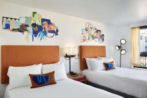 Avatar Hotel Santa Clara, Tapestry Collection by Hilton客房内的一张或多张床位