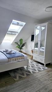 Guesthouse Augusta Insula客房内的一张或多张床位