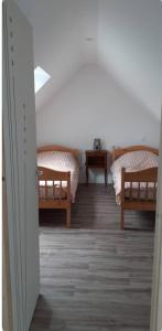 Ένα ή περισσότερα κρεβάτια σε δωμάτιο στο Maison avec mare