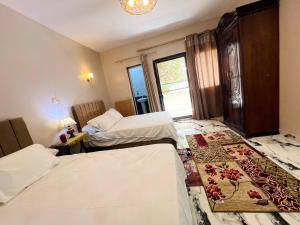 Letto o letti in una camera di Savor The king pyramids hotel