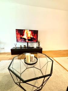 TV a/nebo společenská místnost v ubytování Montparnasse Saint Jacques Paris