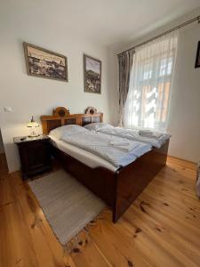 Apartmány Perlaにあるベッド