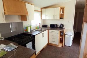 Køkken eller tekøkken på Coral Cove