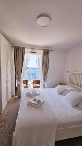 Guesthouse Augusta Insula客房内的一张或多张床位
