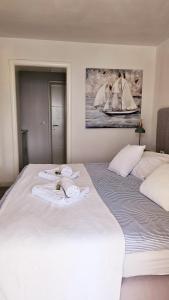 Guesthouse Augusta Insula客房内的一张或多张床位