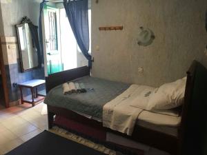 Łóżko lub łóżka w pokoju w obiekcie Guesthouse Kuća na šterne