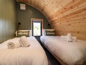 Postel nebo postele na pokoji v ubytování Wren