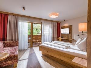 Postel nebo postele na pokoji v ubytování Hotel Sendlhof