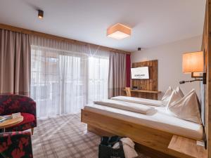 Postel nebo postele na pokoji v ubytování Hotel Sendlhof