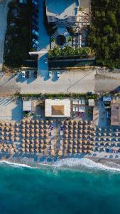 an aerial view of a building next to the water at Sole Luna Hotel in Borsh