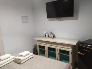 Telewizja i/lub zestaw kina domowego w obiekcie Casa Vladimir
