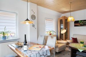 Posezení v ubytování Ferienwohnung Vierheller