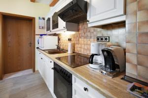 Kuchyň nebo kuchyňský kout v ubytování Ferienwohnung Vierheller
