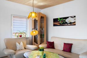 Posezení v ubytování Ferienwohnung Vierheller